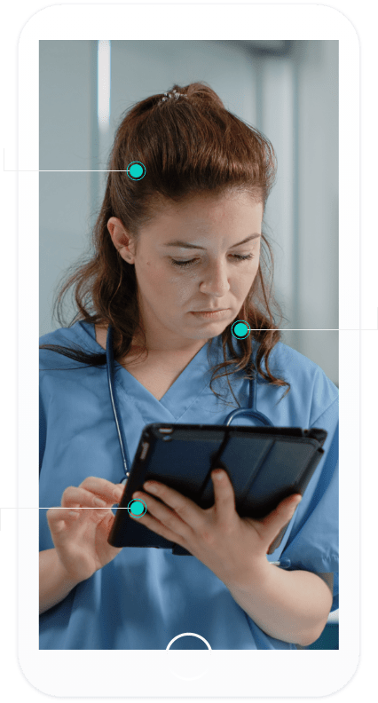Doctor using a tab to check the hospital's digital marketing.